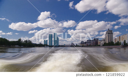 Astana, Kazakhstan. View from Pleasure boat on the river Ishim timelapse hyperlapse drivelapse in Astana. Astana, Kazakhstan. View from Pleasure boat on the river Ishim timelapse hyperlapse drivelapse in Astana. 121859922