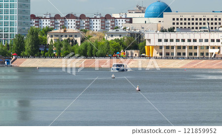 Astana, Kazakhstan. Pleasure boat on the river Ishim timelapse hyperlapse in Astana. 121859952