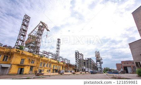 The construction of a large ship on a shipyard with cranes timelapse. The construction of a large ship on a shipyard with cranes timelapse. 121859981