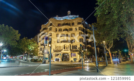 Architecture detail of Casa Mila night timelapse hyperlapse, better known as La Pedrera, in Barcelona, Spain. 121859991