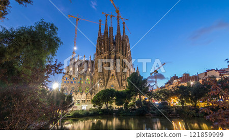 Sagrada Familia, a large church in Barcelona, Spain day to night timelapse. Sagrada Familia, a large church in Barcelona, Spain day to night timelapse. 121859999