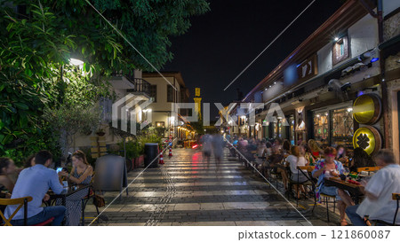 The walk along historic street of Kaleici timelapse hyperlapse with the view on the broken minaret of Kesik Minare Camii mosque in Antalya. The walk along historic street of Kaleici timelapse hyperlapse with the view on the broken minaret of Kesik Minare Camii mosque in Antalya. 121860087