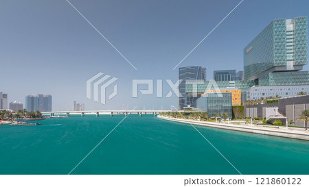Modern buildings in Abu Dhabi skyline timelapse hyperlapse with waterfront. 121860122