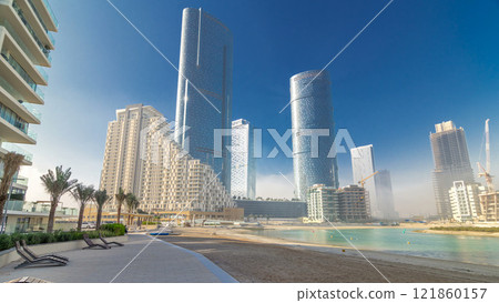 Buildings on Al Reem island in Abu Dhabi timelapse hyperlapse 121860157