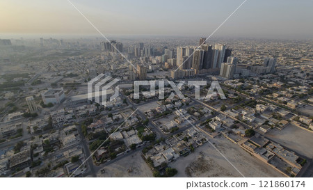 Cityscape of Ajman from rooftop during the morning after sunrise timelapse. Cityscape of Ajman from rooftop during the morning after sunrise timelapse. 121860174
