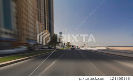 Drive on the streets of Ajman timelapse hyperlapse. Ajman is the capital of the emirate of Ajman in the United Arab Emirates. 121860186