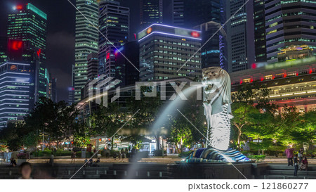 The Merlion fountain and Singapore skyline night timelapse hyperlapse. 121860277