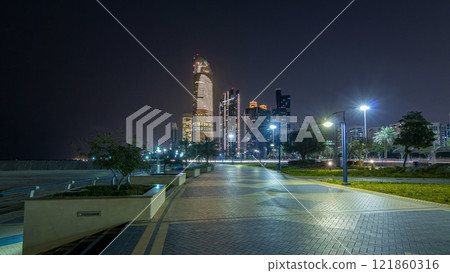 Skyscrapers in Abu Dhabi Skyline at night timelapse hyperlapse, United Arab Emirates 121860316