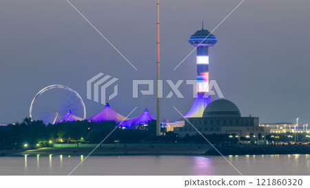 Evening in Abu Dhabi with Marina Island day to night timelapse 121860320