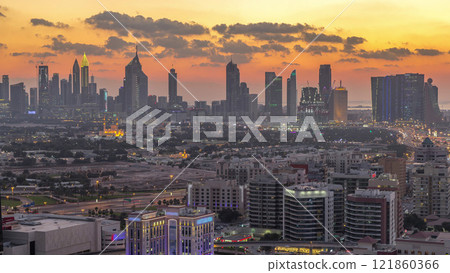 View of transition from day to night in Dubai city, United Arab Emirates Timelapse Aerial View of transition from day to night in Dubai city, United Arab Emirates Timelapse Aerial 121860366