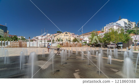 Fountain in Martim Moniz square timelapse hyperlapse in downtown Lisbon 121860388