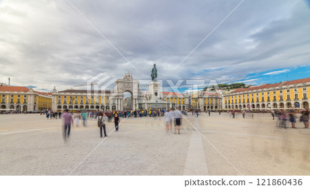 Triumphal arch at Rua Augusta and bronze statue of King Jose I at Commerce square timelapse hyperlapse in Lisbon, Portugal. Triumphal arch at Rua Augusta and bronze statue of King Jose I at Commerce square timelapse hyperlapse in Lisbon, Portugal. 121860436