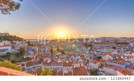 Lisbon at sunset aerial panorama of city centre with red roofs at Autumn evening timelapse, Portugal Lisbon at sunset aerial panorama of city centre with red roofs at Autumn evening timelapse, Portugal 121860447