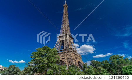 Eiffel Tower from Siene river waterfront in Paris timelapse hyperlapse, France Eiffel Tower from Siene river waterfront in Paris timelapse hyperlapse, France 121860460