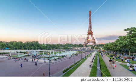 Sunset view of Eiffel Tower timelapse with fountain in Jardins du Trocadero in Paris, France. Sunset view of Eiffel Tower timelapse with fountain in Jardins du Trocadero in Paris, France. 121860465