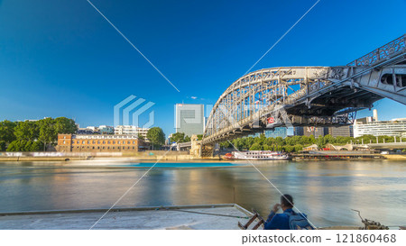 The Austerlitz viaduct in Paris timelapse hyperlapse, seen from bank of the river Seine with a metro train passing The Austerlitz viaduct in Paris timelapse hyperlapse, seen from bank of the river Seine with a metro train passing 121860468