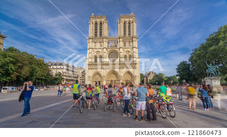 Front facade of cathedral of Notre Dame de Paris, with square full of people in front timelapse hyperlapse 121860473