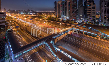 Aerial top view to Sheikh Zayed road near Dubai Marina and JLT night to day timelapse, Dubai. 121860517