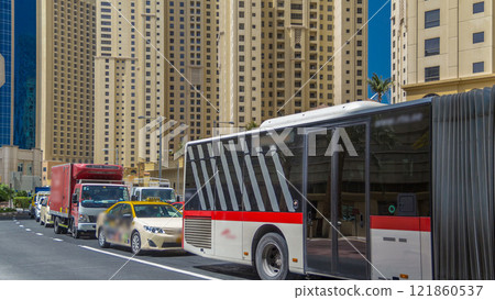 A view of traffic on the street at Jumeirah Beach Residence and Dubai marina timelapse, United Arab Emirates. 121860537