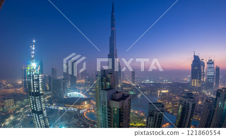 Foggy morning in downtown of Dubai night to day timelapse. 121860554