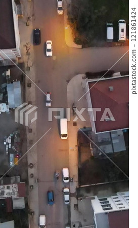 Aerial view evening building roofs Aerial view evening building roofs 121861424