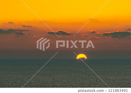 Evening view of the Yakushima Offshore Alps (July) A rare sunset over the East China Sea and a ship 121863491