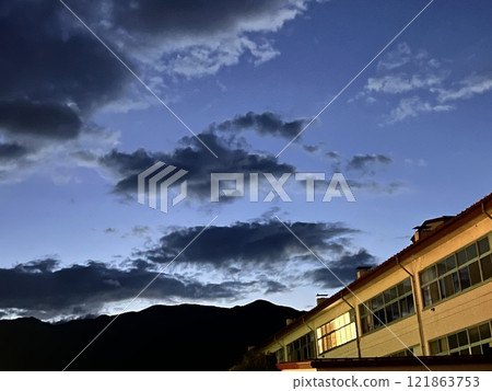 Pre-dawn sky and the sun hiding behind the clouds Pre-dawn sky and the sun hiding behind the clouds 121863753