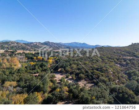Aerial view of Campsites in the valley of Dos Picos County Park in Ramona 121864756