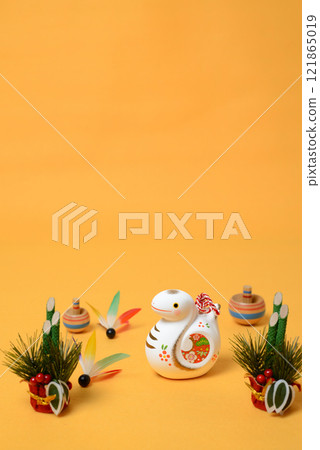 A cute snake figurine, a lucky charm for the beginning of the year in the Orient A cute snake figurine, a lucky charm for the beginning of the year in the Orient 121865019