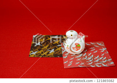 A cute snake figurine, a lucky charm for the beginning of the year in the Orient A cute snake figurine, a lucky charm for the beginning of the year in the Orient 121865082