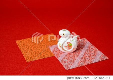 A cute snake figurine, a lucky charm for the beginning of the year in the Orient 121865084