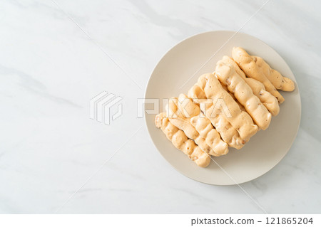 almonds meringue stick on plate almonds meringue stick on plate 121865204