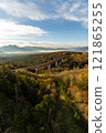 Autumn leaves and sunrise on mountain pass 121865255