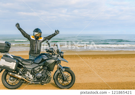 Bikes running along the coastline Bikes running along the coastline 121865421