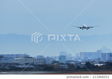 Osaka International Airport JAL Airplane Landing Ready 121866052