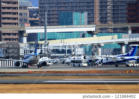 Osaka International Airport ANA Bombardier DHC8-Q400 Propeller Aircraft Takeoff Ready Sky Park 121866402
