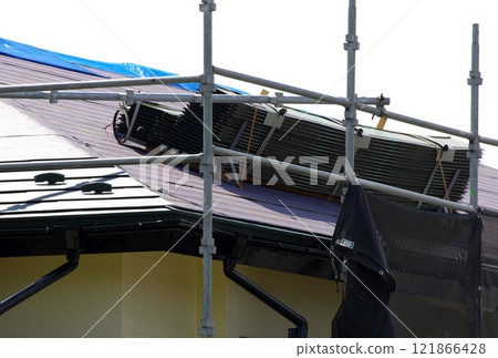 Slate roof covering construction site 121866428