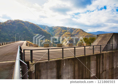 Dam lake and countryside in autumn 121866503