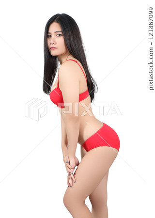 image of woman and red bikini in studio on white background 121867099