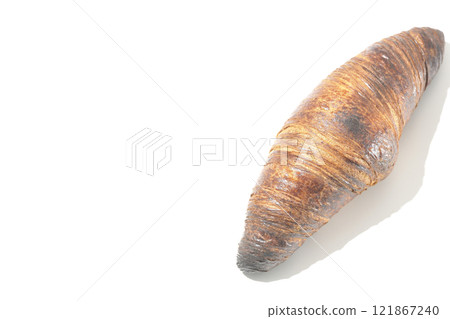 A slightly burnt black wasan photographed against a white background A slightly burnt black wasan photographed against a white background 121867240