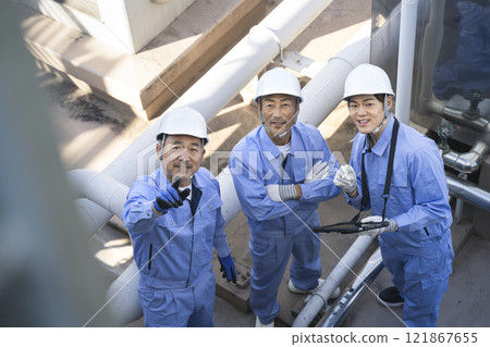 Workers inspecting building facilities 121867655