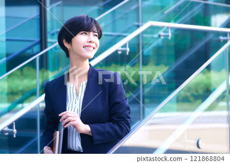 Smiling middle-aged business woman working in the office Photography cooperation: LINK FOREST 121868804