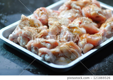 raw chicken or ferment chicken for cook 121869326