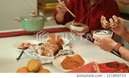 Close up of a festive dining table filled with delicious dishes during Chinese New Year festive Close up of a festive dining table filled with delicious dishes during Chinese New Year festive 121869733