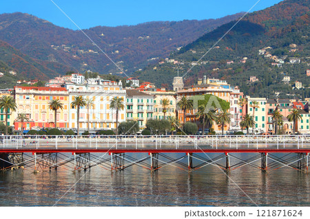 View from sea of traditional buildings and old architecture of Rapallo, Italy. Tourism and recreation. Historical centre. View from sea of traditional buildings and old architecture of Rapallo, Italy. Tourism and recreation. Historical centre. 121871624