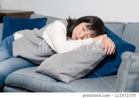 Nap overwork senior woman 121872370