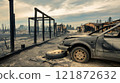 Post-Wildfire Scene of Burned Beachfront Properties and Scorched Landscape 121872632