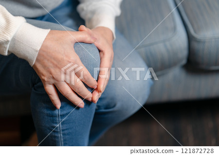 Knee pain, senior woman, hand Knee pain, senior woman, hand 121872728