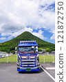 Mount Iino, also known as Sanuki Fuji, can be seen behind a large truck (Marugame City, Kagawa Prefecture) 121872750
