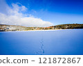 Crossing the frozen Shirakome Pond 121872867